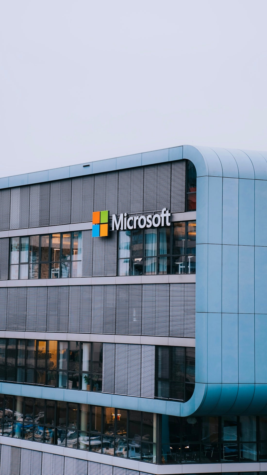 A tall building with a microsoft logo on it